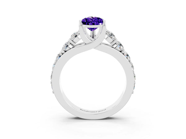 Platinum Pear Cut Tanzanite Engagement Ring with Pavé Band and Four-Prong Setting