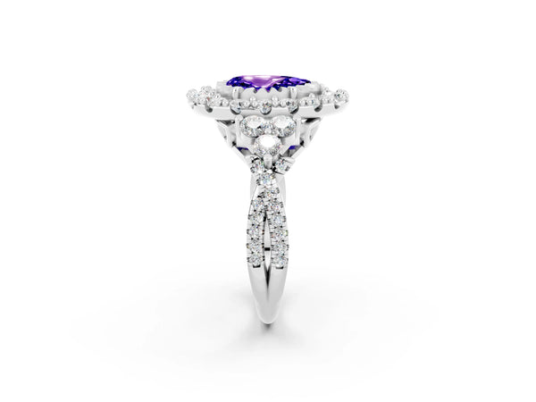 White gold Pear Cut Tanzanite Halo Ring with Pavé Band and Four-Prong Setting