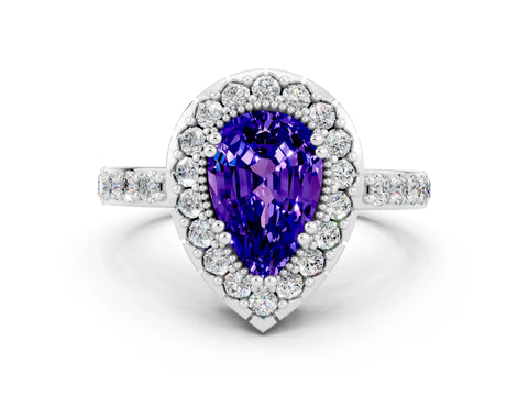 White gold Pear Cut Tanzanite Halo Ring with Pavé Band and Prong Setting