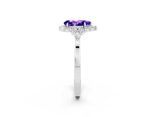 White gold Pear Cut Tanzanite Halo Ring with Pear Side Stones and Prong Setting