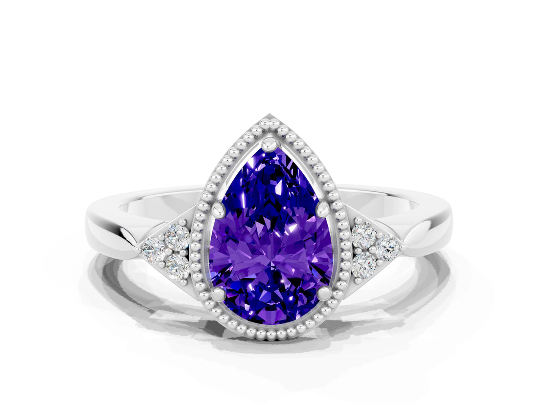 White gold Pear Cut Tanzanite Halo Ring with Tapered Band and Four-Prong Setting