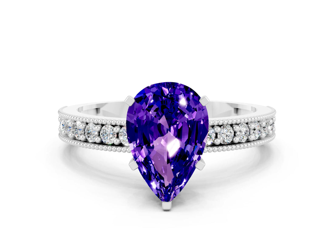 White gold Pear Cut Tanzanite Milgrain Pavé Engagement Ring with Four-Prong Setting