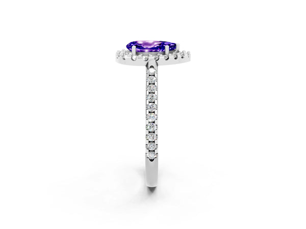 Platinum Pear Cut Tanzanite Pavé Halo Ring with Four-Prong Setting