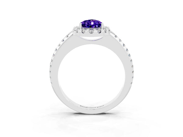Platinum Pear Cut Tanzanite Pavé Halo Ring with Four-Prong Setting