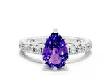 White gold Pear Cut Tanzanite Pavé Solitaire Ring with Round Band and Prong Setting_36