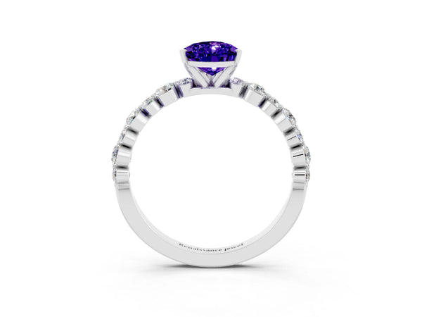 Platinum Pear Cut Tanzanite Prong Set Engagement Ring with Pavé Band