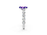 White gold Pear Cut Tanzanite Prong Setting with Side Stones on a Pave Band_2