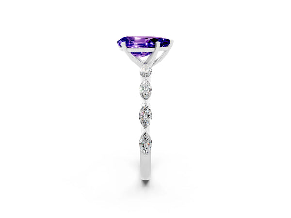 Platinum Pear Cut Tanzanite Ring with Marquise Side Stones and Prong Setting