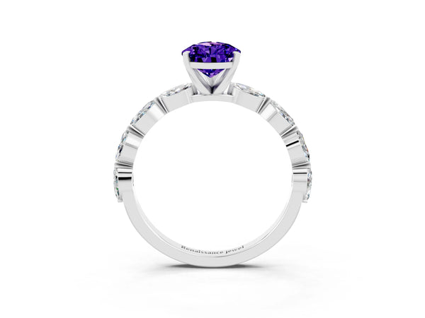 Platinum Pear Cut Tanzanite Ring with Marquise Side Stones and Prong Setting