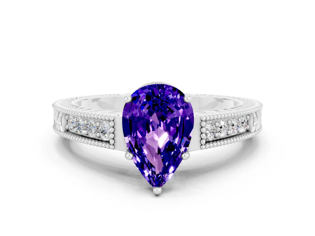 White gold Pear Cut Tanzanite Ring with Milgrain Pavé Band and Four-Prong Setting_36
