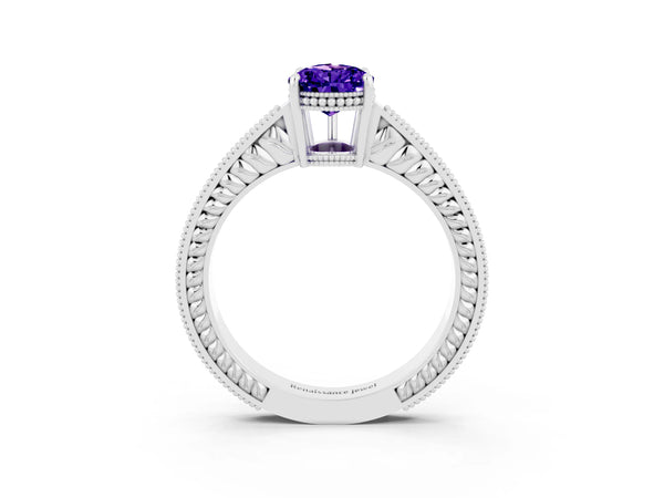 Silver Pear Cut Tanzanite Ring with Milgrain Pavé Band and Four-Prong Setting