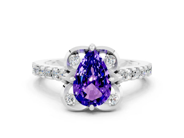 Platinum Pear Cut Tanzanite Ring with Pavé Band and Floral Prong Setting