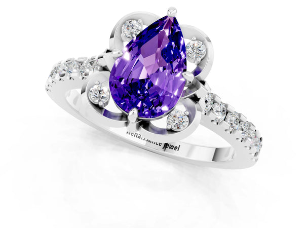 Platinum Pear Cut Tanzanite Ring with Pavé Band and Floral Prong Setting