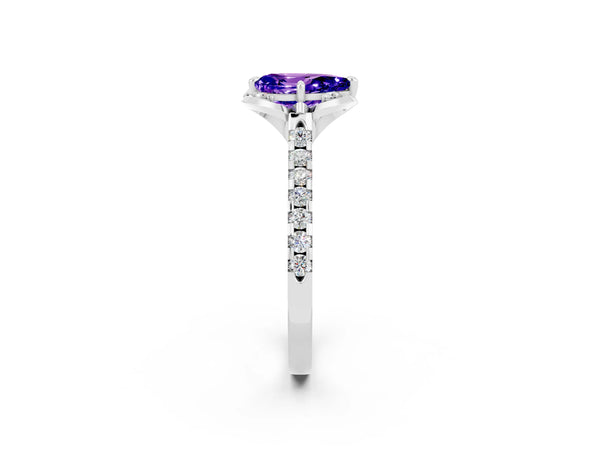 White gold Pear Cut Tanzanite Ring with Pavé Band and Floral Prong Setting