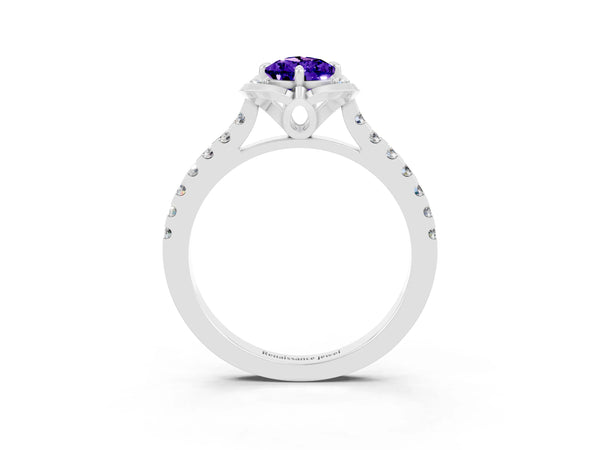 Platinum Pear Cut Tanzanite Ring with Pavé Band and Floral Prong Setting
