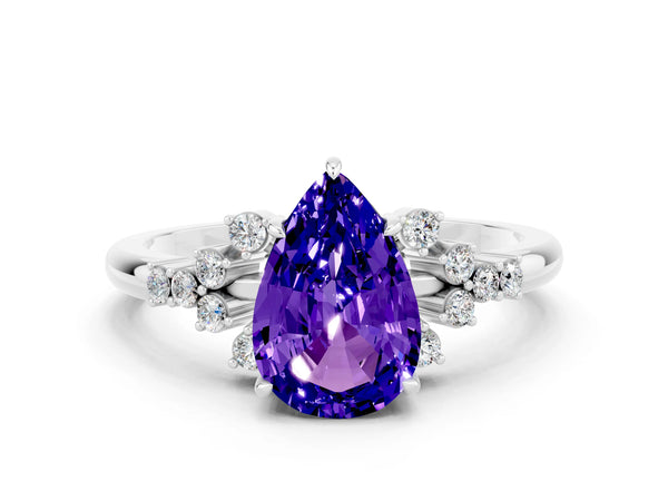 Silver Pear Cut Tanzanite Ring with Side Stones and Four-Prong Setting