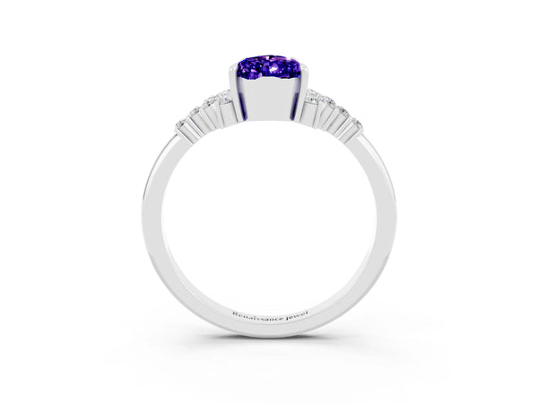 Silver Pear Cut Tanzanite Ring with Side Stones and Four-Prong Setting
