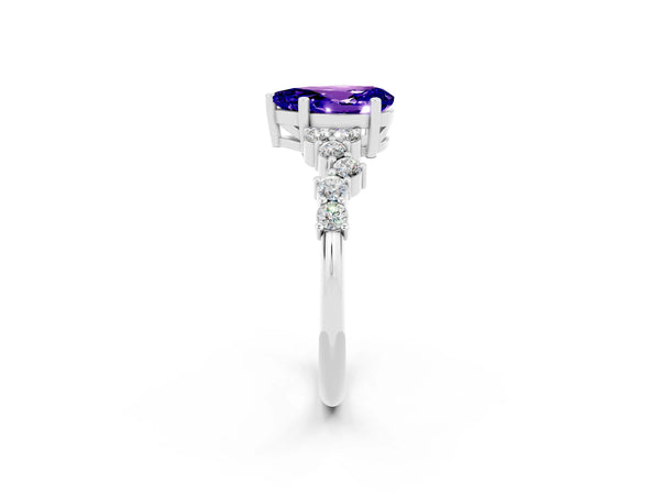 Silver Pear Cut Tanzanite Scattered Round Accent Ring with Prong Setting