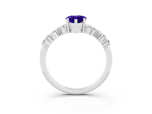 Platinum Pear Cut Tanzanite Scattered Round Accent Ring with Prong Setting
