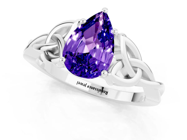 Silver Pear Cut Tanzanite Solitaire Celtic Knot Ring with Four-Prong Setting