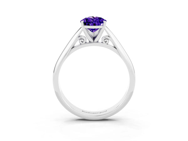 Silver Pear Cut Tanzanite Solitaire Engagement Ring with Cathedral Setting and Four-Prong Mount