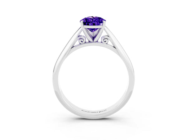 White gold Pear Cut Tanzanite Solitaire Engagement Ring with Cathedral Setting and Four-Prong Mount