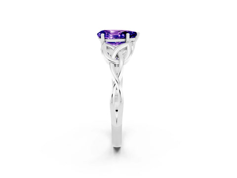 White gold Pear Cut Tanzanite Solitaire Engagement Ring with Celtic Knot Band and Four-Prong Setting_2