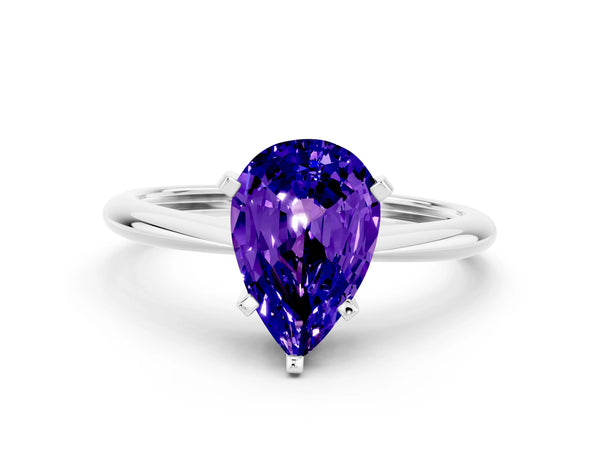 White gold Pear Cut Tanzanite Solitaire Engagement Ring with Classic Band and Four-Prong Setting