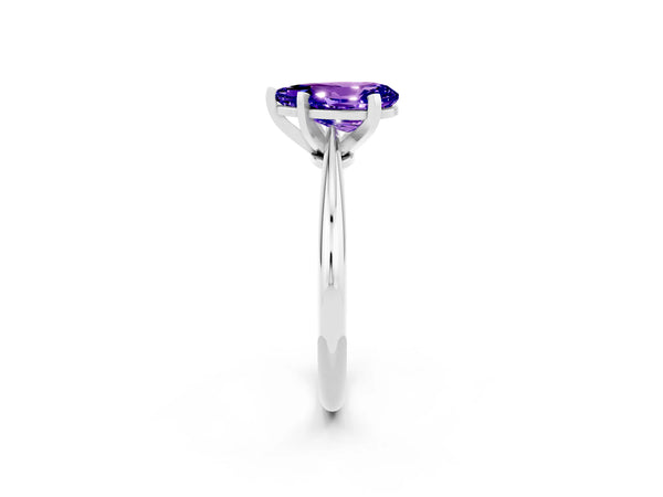 White gold Pear Cut Tanzanite Solitaire Engagement Ring with Classic Band and Four-Prong Setting