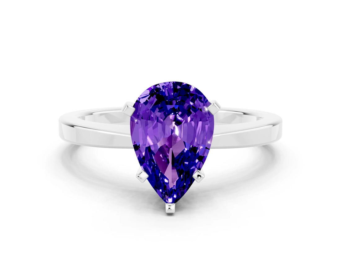 White gold Pear Cut Tanzanite Solitaire Engagement Ring with Classic Band and Four-Prong Setting_24