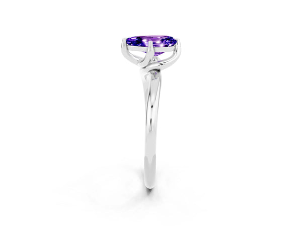 White gold Pear Cut Tanzanite Solitaire Engagement Ring with Four-Prong Setting and Classic Band