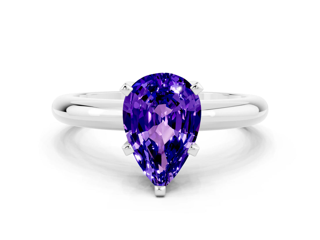 White gold Pear Cut Tanzanite Solitaire Engagement Ring with Round Band and Four-Prong Setting_24