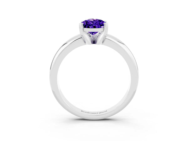 Silver Pear Cut Tanzanite Solitaire Engagement Ring with Round Band and Four-Prong Setting