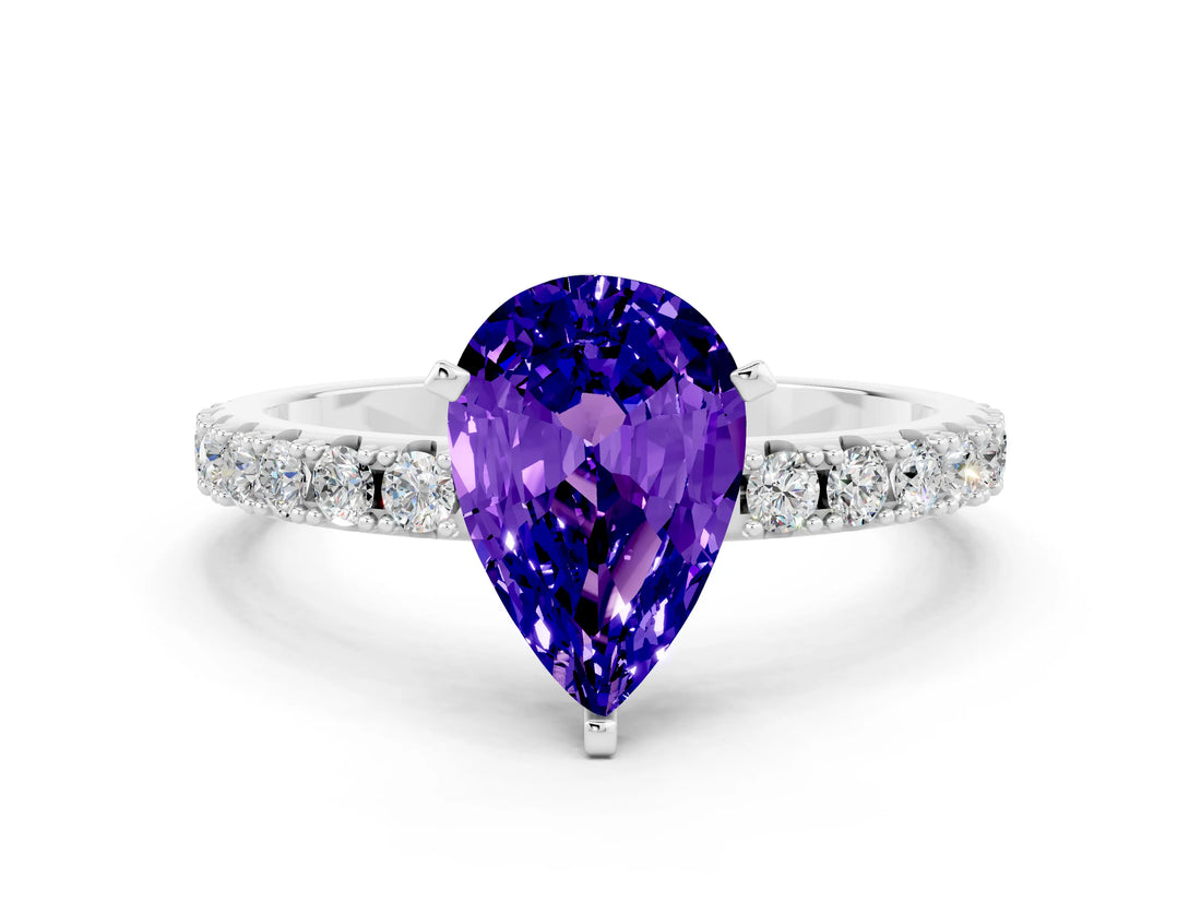 White gold Pear Cut Tanzanite Solitaire Pavé Band with Four-Prong Setting