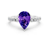 White gold Pear Cut Tanzanite Solitaire Pavé Band with Four-Prong Setting