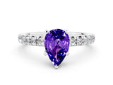 White gold Pear Cut Tanzanite Solitaire Pavé Engagement Ring with Round Band and Prong Setting_12