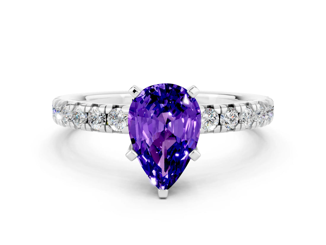 White gold Pear Cut Tanzanite Solitaire Pavé Engagement Ring with Round Band and Prong Setting_66