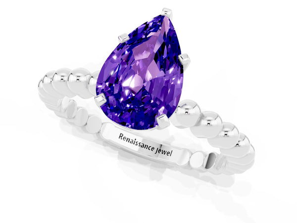 White gold Pear Cut Tanzanite Solitaire Ring with Beaded Band and Prong Setting