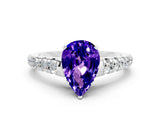 White gold Pear Cut Tanzanite Solitaire Ring with Cathedral Setting and Pavé Band