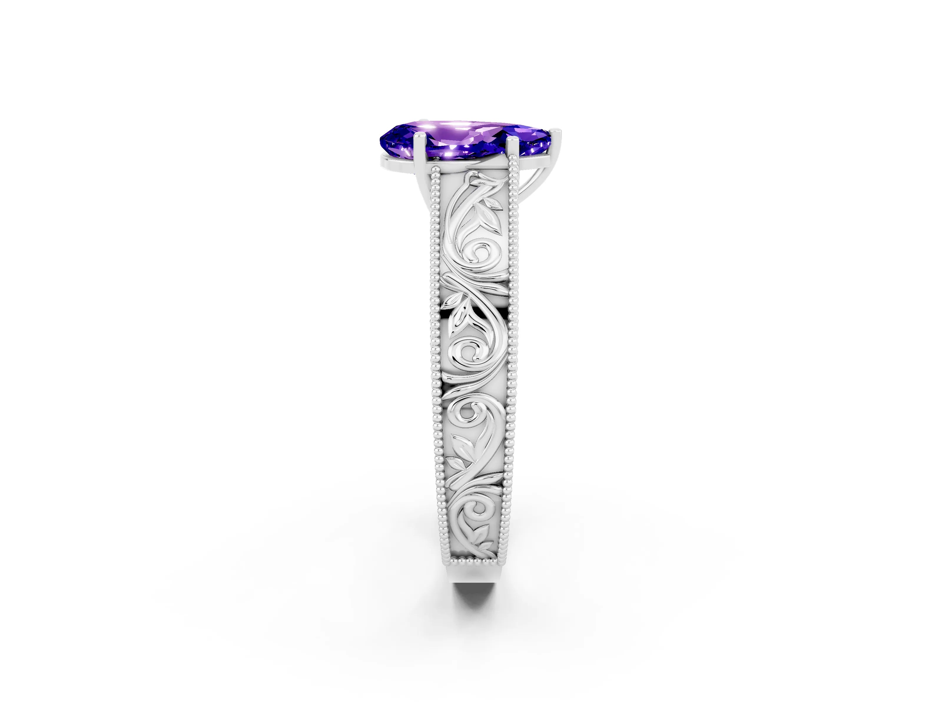 White gold Pear Cut Tanzanite Solitaire Ring with Engraved Band and Four-Prong Setting_2
