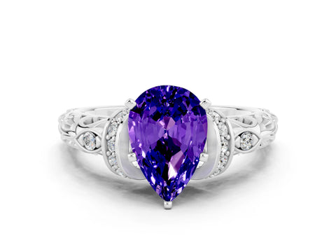 White gold Pear Cut Tanzanite Solitaire Ring with Filigree Band and Four-Prong Setting_33