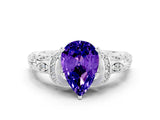 White gold Pear Cut Tanzanite Solitaire Ring with Filigree Band and Four-Prong Setting_36