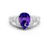White gold Pear Cut Tanzanite Solitaire Ring with Filigree Band and Four-Prong Setting_48