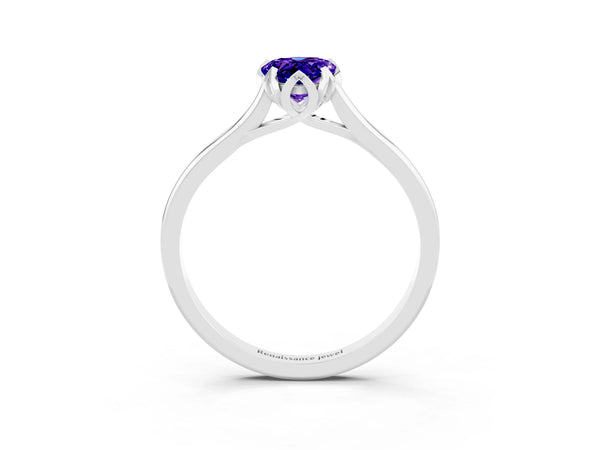 White gold Pear Cut Tanzanite Solitaire Ring with Flower Prong Setting and Classic Band