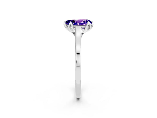 White gold Pear Cut Tanzanite Solitaire Ring with Flower Prong Setting and Classic Band