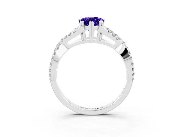 Platinum Pear Cut Tanzanite Solitaire Ring with Four-Prong Setting and Twisted Pavé Band