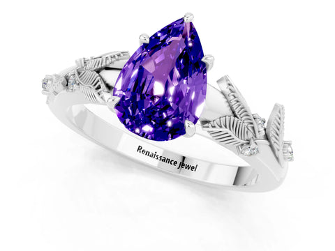 White gold Pear Cut Tanzanite Solitaire Ring with Leaf Motif Band and Four-Prong Setting_13