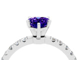 White gold Pear Cut Tanzanite Solitaire Ring with Pavé Accents and Four-Prong Setting_4