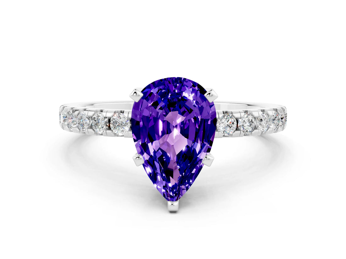 White gold Pear Cut Tanzanite Solitaire Ring with Pavé Band and Four-Prong Setting_24