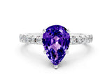 White gold Pear Cut Tanzanite Solitaire Ring with Pavé Band and Four-Prong Setting_24